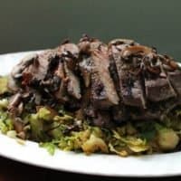 Mushroom Stuffed London Broil Steak in a Cast Iron Skillet